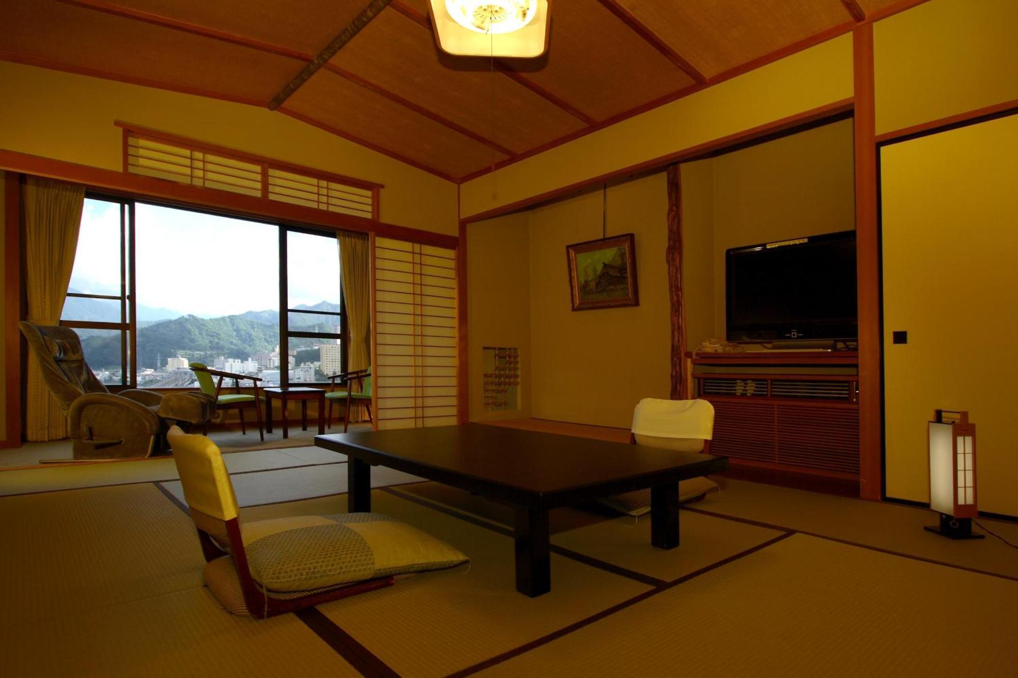Takahan Yuzawa  Chambre photo